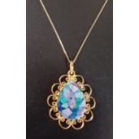 MOSAIC OPAL DOUBLET PENDANT in twenty-one carat gold pieced mount, approximately 3.2cm high