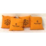 SET OF FOUR BRANDED VEUVE CLICQUOT CUSHIONS the bright orange cushions with embroidered detail to