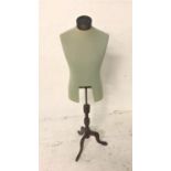 EARLY 20TH CENTURY GENTS TORSO MANNEQUIN on an adjustable brass column and mahogany tripod base