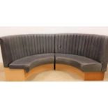 PAIR OF CURVED GREY VINYL BANQUETTE SEATS with ribbed high backs above padded seats, approximately