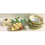 SELECTION OF DECORATIVE CERAMICS including a Poole square preserve pot with a Bee finial to the lid,