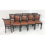 SET OF TEN DINING CHAIRS with shaped padded backs and seats in brown vinyl covering and with