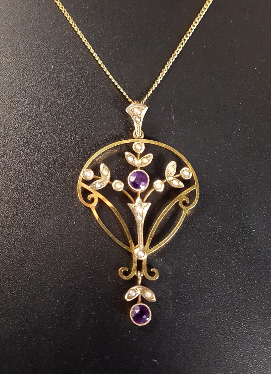 AMETHYST AND SEED PEARL HOLBEIN PENDANT in nine carat gold and on nine carat gold chain