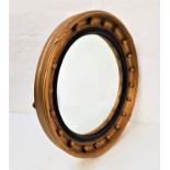 CIRCULAR GILTWOOD CONVEX WALL MIRROR with applied ball decoration, 53cm diameter