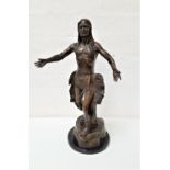 SPELTER FIGURE OF A NATIVE AMERICAN the figure in traditional dress with outstretched arms, raised