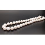 WHITE FRESHWATER BAROQUE PEARL NECKLACE with large individually knotted pearls, approximately 46cm