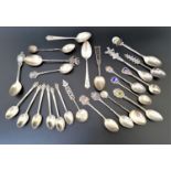 SELECTION OF SILVER SOUVENIR AND OTHER TEASPOONS including a set of six Thai spoons with deity