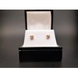 PAIR OF DIAMOND STUD EARRINGS the round brilliant cut diamonds totaling approximately 0.3cts, in