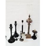 SIX VARIOUS TABLE LAMPS comprising a converted Corinthian Column lamp; a pair of black plastic