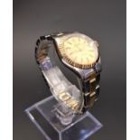 TUDOR PRINCESS OYSTERDATE WRIST WATCH with a circular gold coloured dial with baton markers and