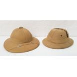 TWO CLOTH COVERED PITH HELMETS one size 7, the other with adjustable headband (2)