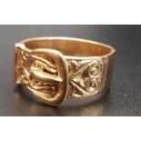 GEORGE V NINE CARAT GOLD BUCKLE DESIGN RING with scroll decoration, hallmarks for London 1977, ring