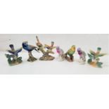 SEVEN LUSTRE WARE FIGURINES including two birds on a branch, marked to the base Jema Holland 271,