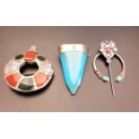 A SCOTTISH AGATE SET SILVER PLAID BROOCH of buckled garter shape set with agate, carnelian and