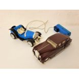 LB ROLLS ROYCE TOY CAR battery operated, in burgundy coloured plastic, together with an early 20th
