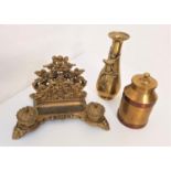 ORNATE BRASS DESK STAND with a decorative pierced raised back letter rack, with central pen tray