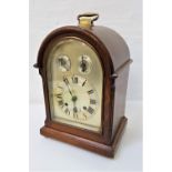 EARLY 20th CENTURY OAK ARCHED TOP THREE TRAIN MANTLE CLOCK the silvered dial with Roman numerals and