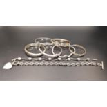 EIGHT VARIOUS SILVER BANGLES AND BRACELETS including a Mackintosh style bangle, two hinged bangles