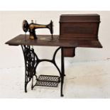 SINGER TRAEDLE SEWING MACHINE serial number 13504052, with a single drawer and metal frame base