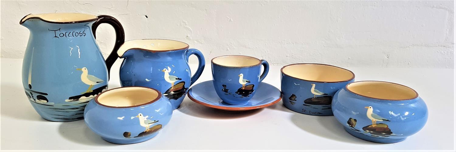 SELECTION OF DARTMOUTH POTTERY all decorated with a blue ground with brown highlights, comprising