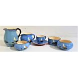 SELECTION OF DARTMOUTH POTTERY all decorated with a blue ground with brown highlights, comprising