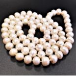 FRESHWATER PEARL NECKLACE all individually knotted, approximately 90cm long