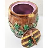 VICTORIAN MAJOLICA BISCUIT BARREL with vines and leaf relief decoration, the circular lid with a