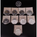 BATTLE OF BRITAIN PROOF COINS comprising The Hawker Hurricane, The London Blitz, Douglas Bader,