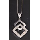 DIAMOND SET PENDANT the diamonds set to the lower of two interlocking geometric links, in nine carat