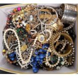 LARGE SELECTION OF COSTUME JEWELLERY including bangles, bracelets, simulated pearls, bead necklaces,