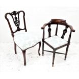 EDWARDIAN MAHOGANY AND INLAID CORNER ARMCHAIR with a shaped top rail supported by pierced and turned