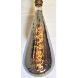TWO LARGE FEATURE LIGHT BULBS of pear shape with a silvered finish and decorative spiral filament,