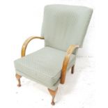 ELM FRAME ARMCHAIR with a shaped padded back and seat, with curved arms, standing on front