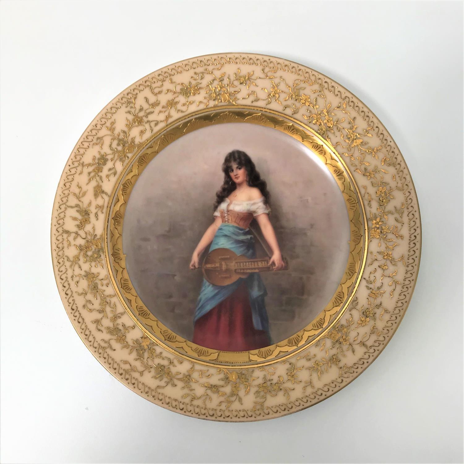 ROYAL VIENNA CABINET PLATE the centre hand painted with female musician holding a hurdy-gurdy,