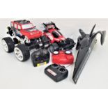 THREE RADIO CONTROLLED VEHICLES including a Nikko Fire Runner off road racer with hand held