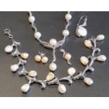 FRESHWATER CULTURED PEARL SET SILVER NECKLACE with certificate; together with a similar bracelet,