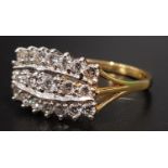 DIAMOND CLUSTER DRESS RING the multiple diamonds in three rows totaling approximately 0.85cts, on