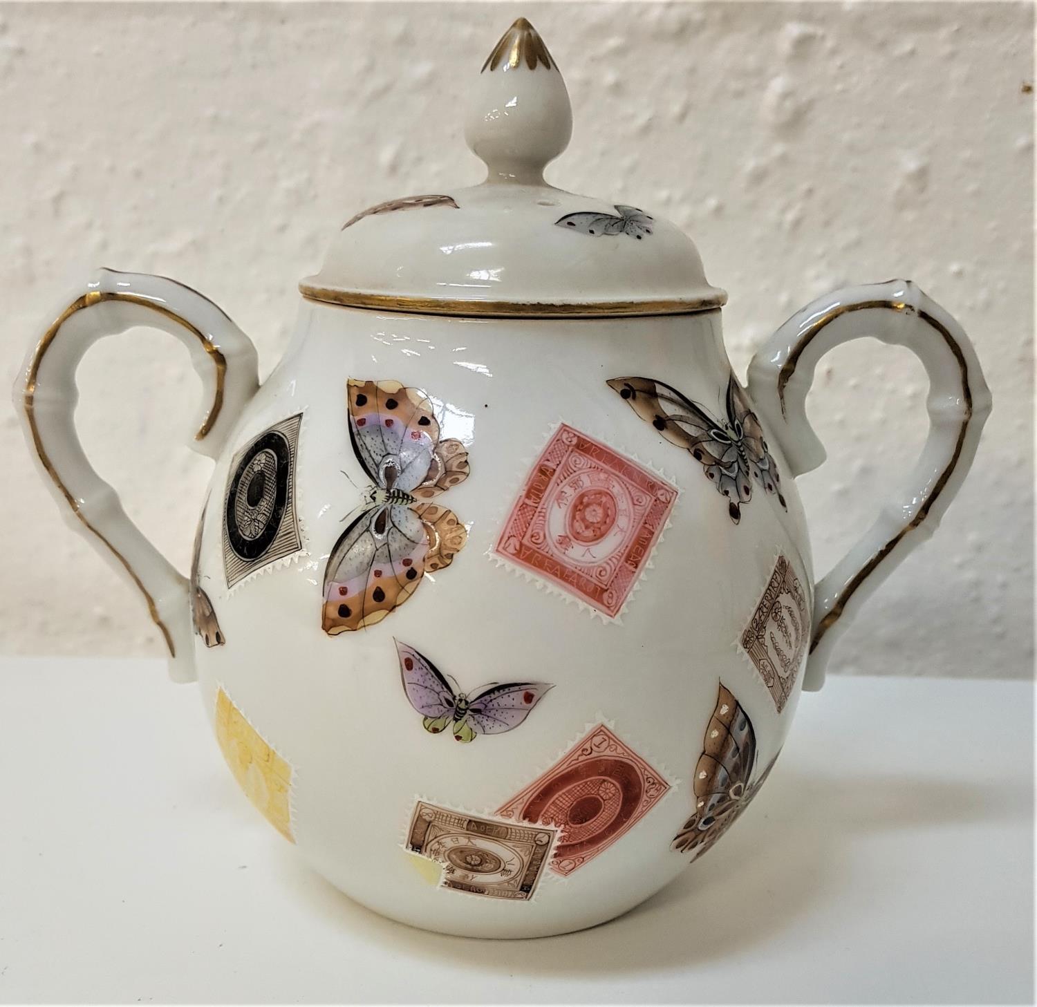 JAPANESE PORCELAIN LIDDED SUGAR BOWL with simulated bamboo handles, the lid and body decorated