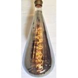 TWO LARGE FEATURE LIGHT BULBS of pear shape with a silvered finish and decorative spiral filament,