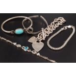 SELECTION OF FIVE SILVER BRACELETS AND BANGLES including a turquoise set bangle and Tiffany style