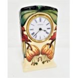 MOORCROFT 'ANNA LILY' PATTERN MANTEL CLOCK the tube lined floral decoration on a cream ground,