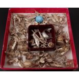 INTERESTING SELECTION OF SILVER AND OTHER CHARMS including an articulated fish, a treasure chest,