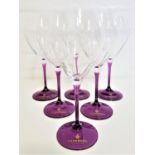 SET OF SIX BRANDED CHAMBORD WINE GLASSES with clear glass bowls and lilac stems and foot (6)