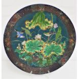 19th CENTURY LARGE WALL CHARGER decorated with a blue green ground with birds and flowers encased by