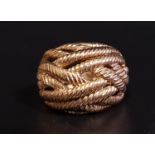 NINE CARAT GOLD BOMBE STYLE RING with entwined rope twist strands, ring size O-P and approximately