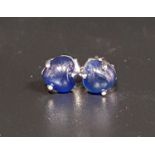 PAIR OF SAPPHIRE STUD EARRINGS the heart shaped cabochon sapphires in unmarked white gold, the