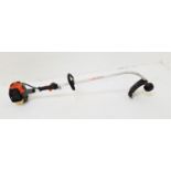 HITACHI GARDEN STRIMMER with a 2 stroke engine, model J102589