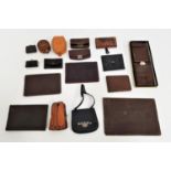 SELECTION OF LEATHER PURSES, WALLETS AND BOXES including two stud boxes, a new and boxed wallet, a