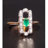 ART DECO STYLE EMERALD AND DIAMOND RING the central oval cut emerald in shaped and pierced diamond