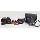 SELECTION OF CASED CAMERAS including an Adox folding camera, Ensign E20, Polaroid Super Swinger